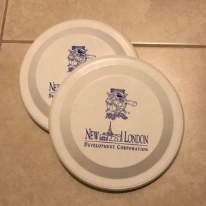 Two white flying discs